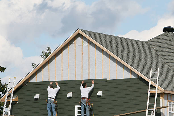 Professional Emergency Siding Repair technician working in Henderson, NC